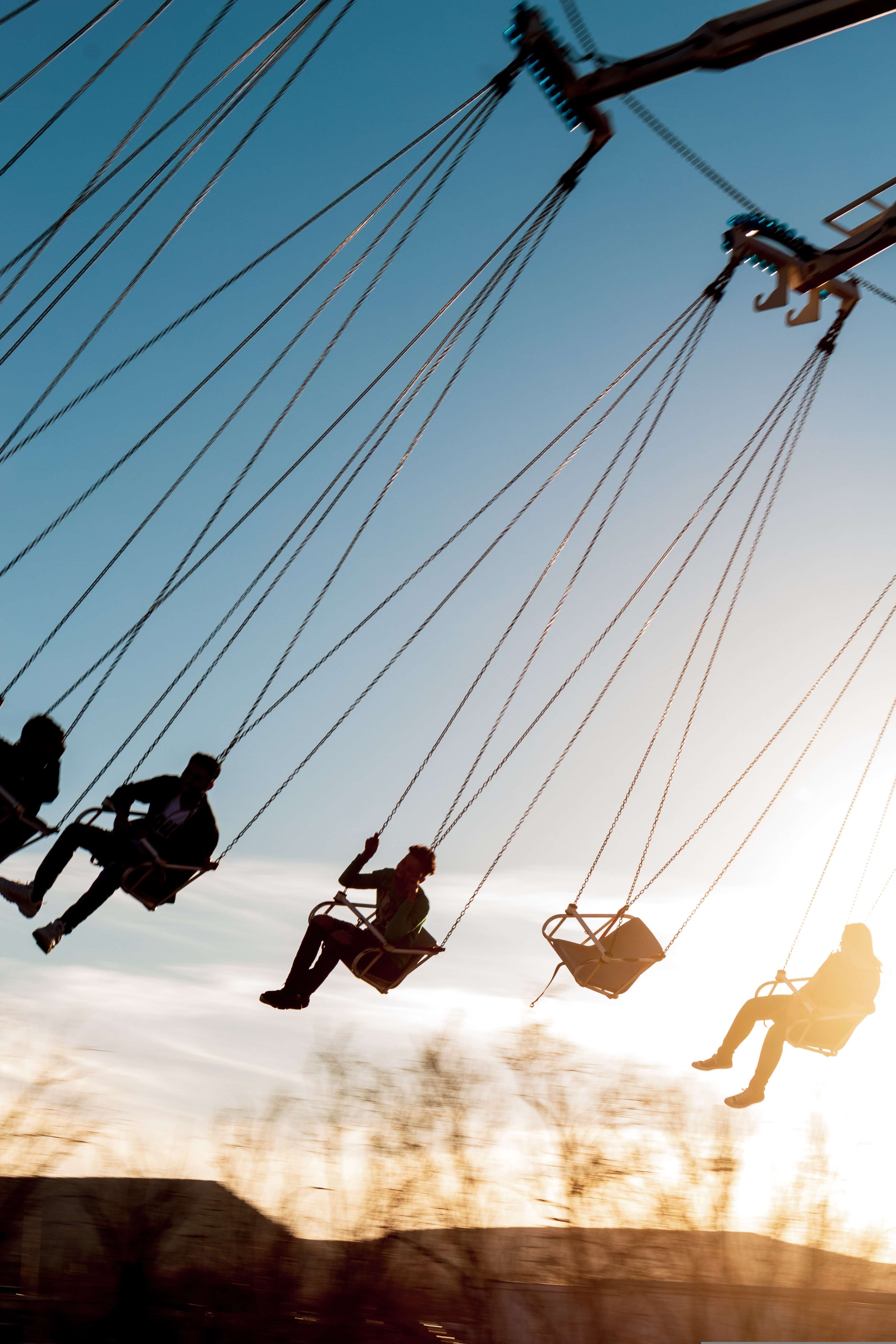 Swing ride at sunset_unsplash_gabriel-valdez_2022